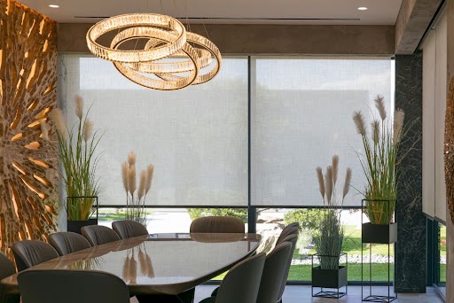 Modern outdoor patio with clear blinds installed for weather protection and year-round outdoor living